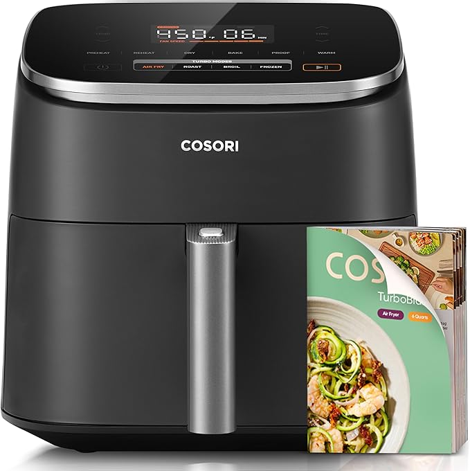 Dark-gray COSORI TurboBlaze six-quart air fryer with its cooking controls and recipe booklet.