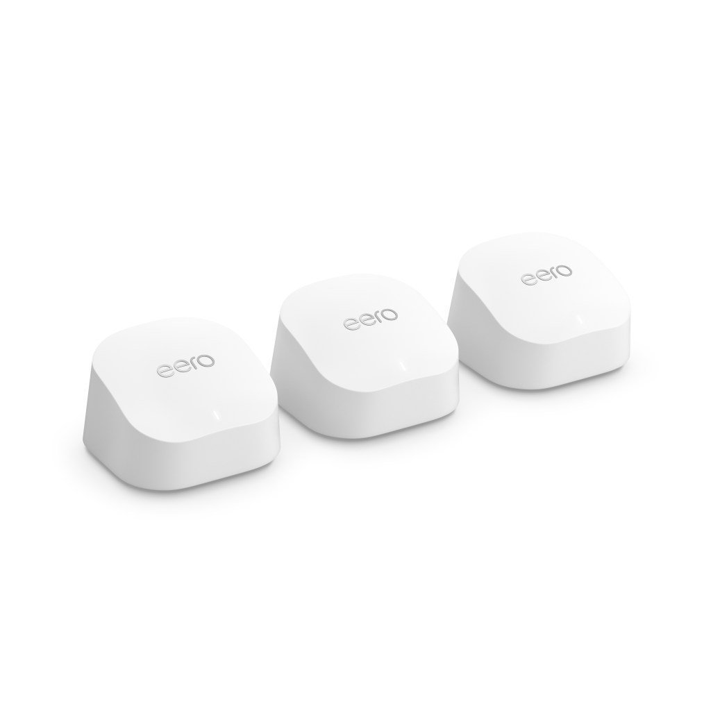 Three white eero 6+ mesh Wi-Fi routers