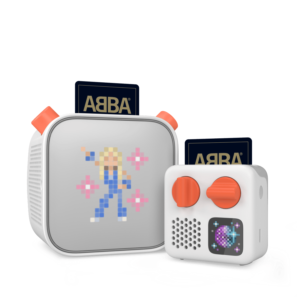 Yoto Mini at right and larger Yoto Player at left, both displaying ABBA cards.